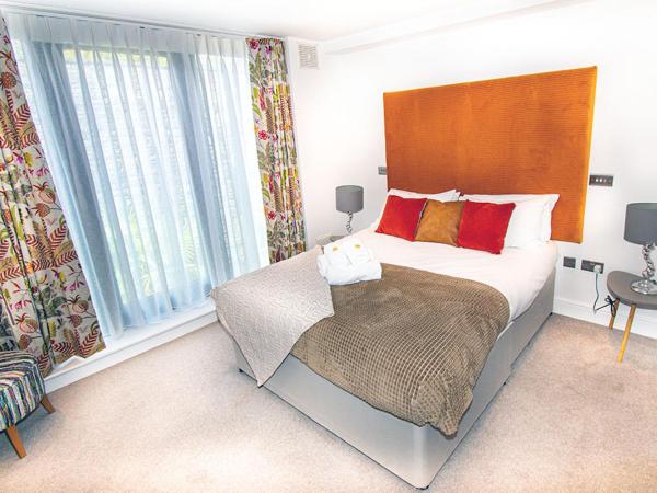 Beachcliff Rooms & Apartments : photo 8 de la chambre chambre double - vue sur jardin