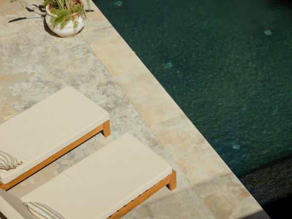 Les Palmiers Boutique Hôtel & Spa : photo 1 de la chambre suite avec piscine privée