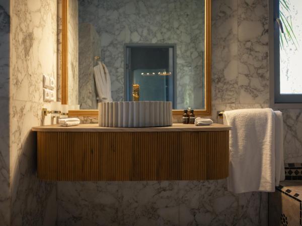 Les Palmiers Boutique Hôtel & Spa : photo 2 de la chambre suite 2 chambres