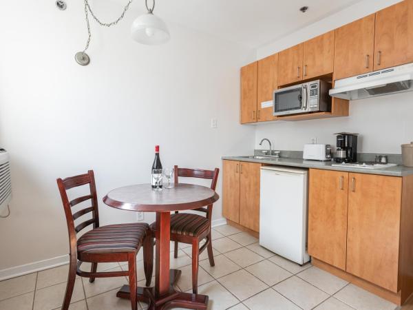 Hotel les Suites Labelle : photo 5 de la chambre studio lit queen-size supérieur