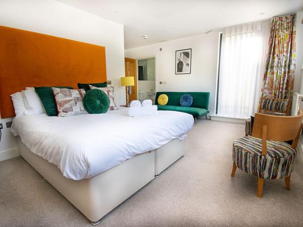 Beachcliff Rooms & Apartments : photo 10 de la chambre chambre double - vue sur jardin