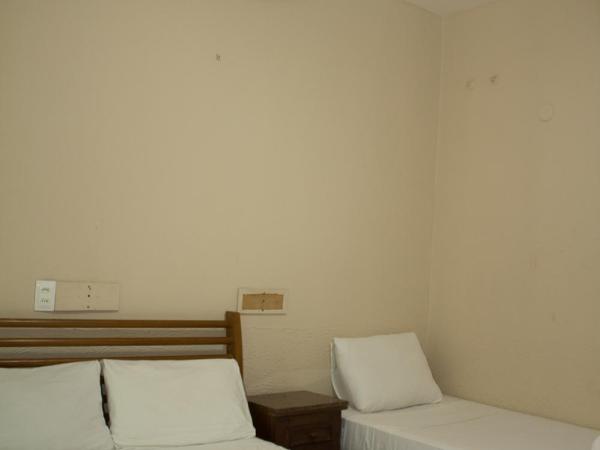 Pousada Casa da Pedra : photo 4 de la chambre chambre triple deluxe