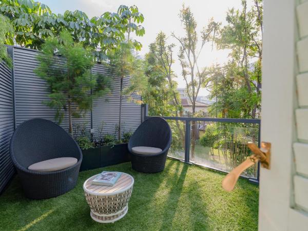 KēSa House, The Unlimited Collection managed by The Ascott Limited : photo 7 de la chambre studio premier avec balcon ou salon