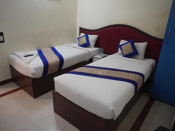 The Dolphin Park Hotel, Virugambakkam : photo 3 de la chambre chambre lits jumeaux standard