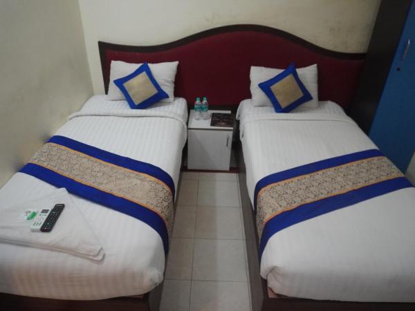 The Dolphin Park Hotel, Virugambakkam : photo 6 de la chambre chambre lits jumeaux standard