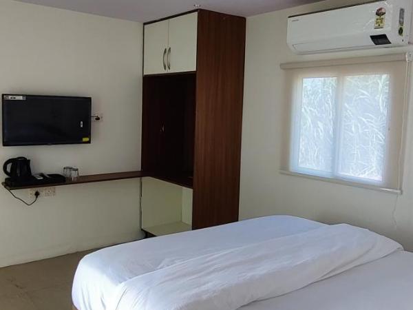 Group Cabin at Clapping Leaves : photo 3 de la chambre chambre quadruple premium