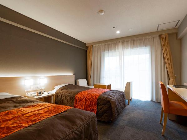 Maple Arima : photo 1 de la chambre chambre lits jumeaux standard avec salle de bains commune