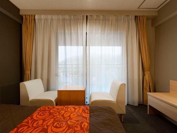 Maple Arima : photo 3 de la chambre chambre lits jumeaux standard avec salle de bains commune