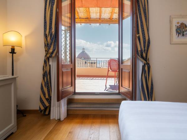 Hotel Croce Di Malta : photo 6 de la chambre chambre double ou lits jumeaux - vue sur jardin