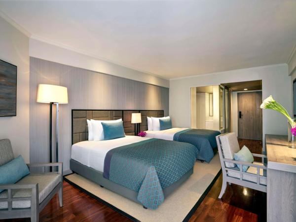 Avani Pattaya Resort : photo 2 de la chambre chambre deluxe - vue sur jardin