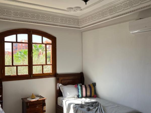 Villa : photo 1 de la chambre chambre lits jumeaux - vue sur jardin