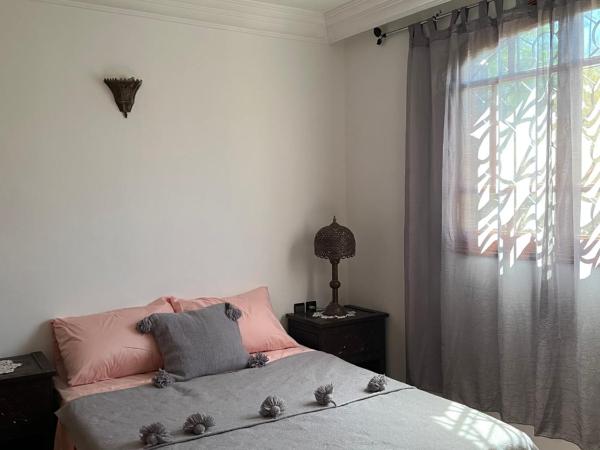 Villa : photo 2 de la chambre chambre double - vue sur jardin