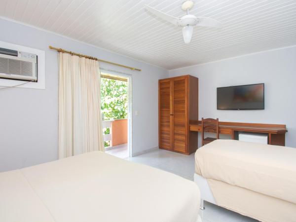 Pousada Marbella Inn : photo 1 de la chambre chambre familiale