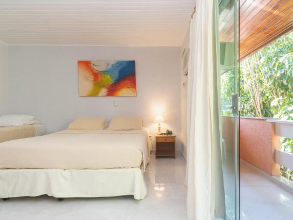 Pousada Marbella Inn : photo 3 de la chambre chambre familiale