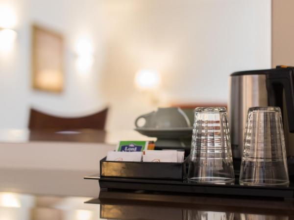 Delice Hotel - Family Apartments : photo 5 de la chambre chambre double ou lits jumeaux