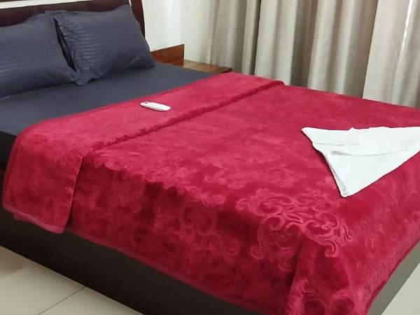 Just Homes - PG : photo 1 de la chambre chambre lit king-size