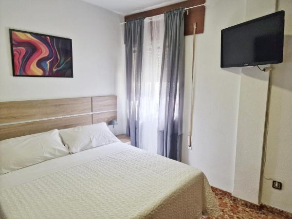 Apartamento San Agustín - Alojamientos El Duque : photo 2 de la chambre chambre double avec salle de bains commune