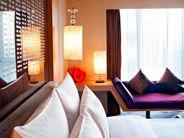 Le Méridien Qingdao : photo 2 de la chambre chambre lit king-size classique avec vue sur la ville