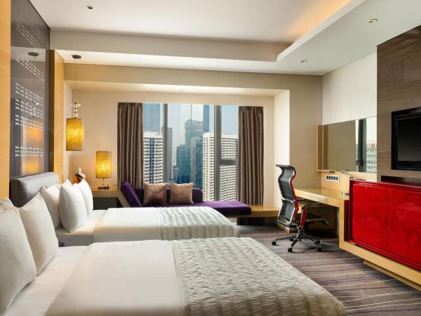 Le Méridien Qingdao : photo 1 de la chambre chambre lits jumeaux club avec accès au salon - vue sur ville