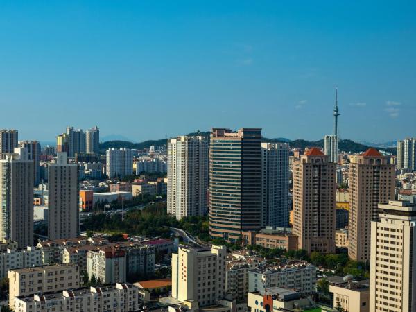 Le Méridien Qingdao : photo 6 de la chambre chambre lit king-size deluxe - vue sur ville