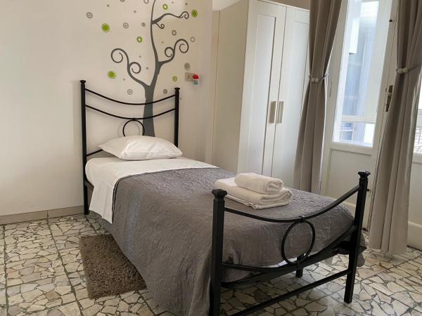 Night & Day : photo 2 de la chambre chambre simple avec salle de bains 
