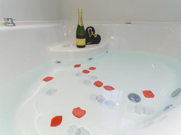 Hotel San Lorenzo Boutique : photo 4 de la chambre chambre double avec baignoire spa