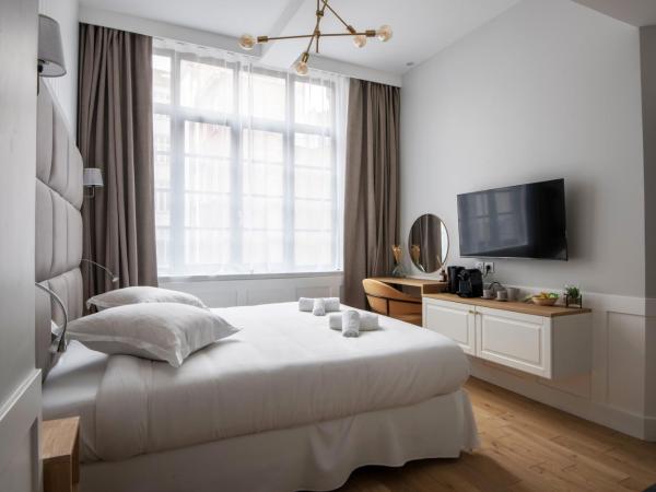 Les Suites Faidherbe : photo 2 de la chambre chambre lit king-size deluxe