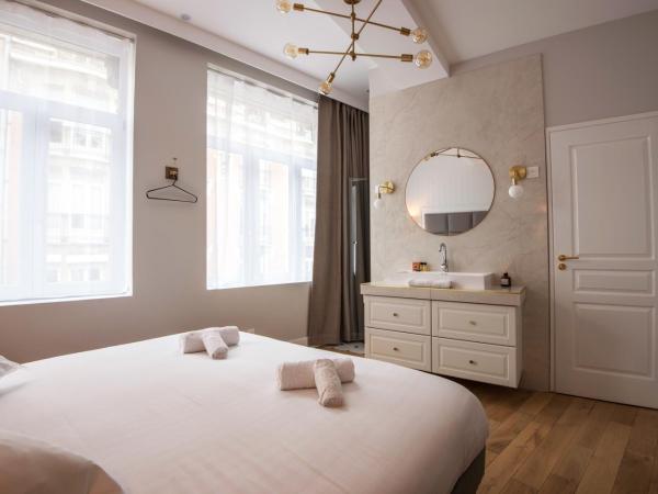 Les Suites Faidherbe : photo 5 de la chambre chambre lit king-size