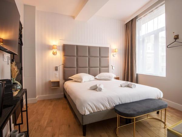 Les Suites Faidherbe : photo 2 de la chambre chambre lit king-size