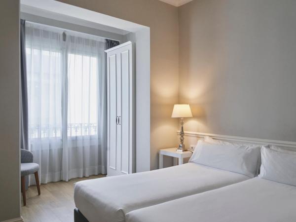 Mesón Castilla Atiram Hotels : photo 3 de la chambre chambre lits jumeaux