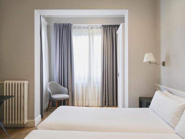 Mesón Castilla Atiram Hotels : photo 1 de la chambre chambre lits jumeaux