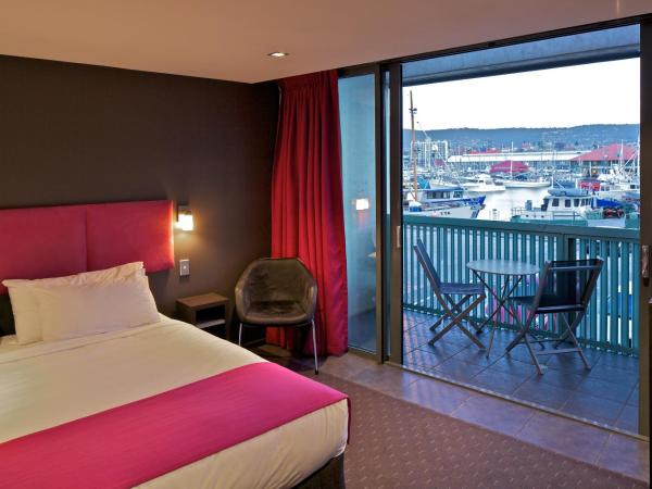 Zero Davey Boutique Apartment Hotel : photo 1 de la chambre studio - vue sur port