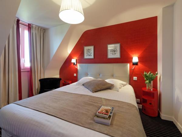 Hôtel La Résidence des Artistes : photo 3 de la chambre chambre simple confort « croco »