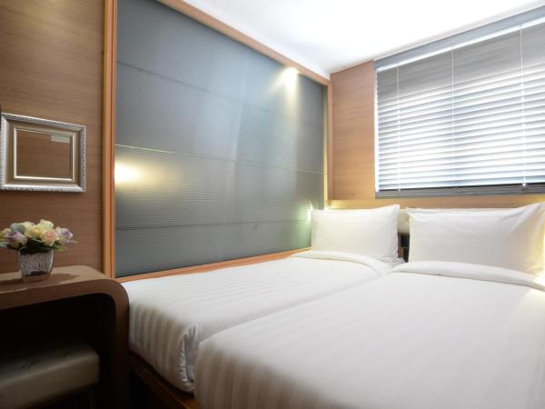 Bluejay Residences : photo 3 de la chambre chambre lits jumeaux