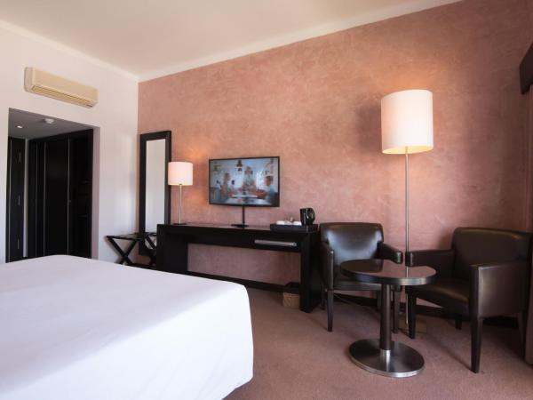 Vila Gale Collection Praia : photo 3 de la chambre chambre double ou lits jumeaux - vue sur piscine