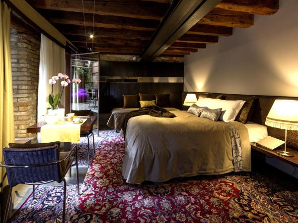 Avogaria 5 Rooms : photo 6 de la chambre suite junior confort avec jardin privé