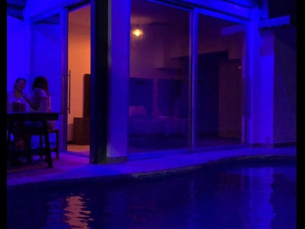 Cancún Hotel Boutique & Hostel : photo 3 de la chambre chambre triple - vue sur la piscine