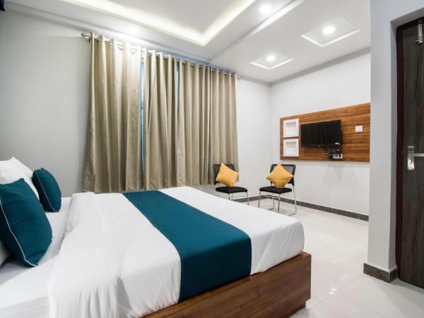 Collection O Hotel Blue Shine : photo 1 de la chambre chambre double standard