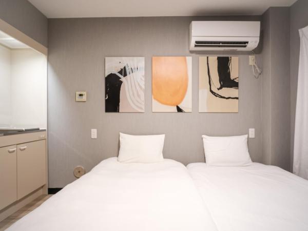 殿堂 : photo 8 de la chambre chambre lits jumeaux avec baignoire