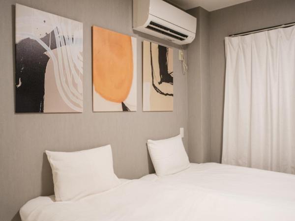 殿堂 : photo 10 de la chambre chambre lits jumeaux avec baignoire