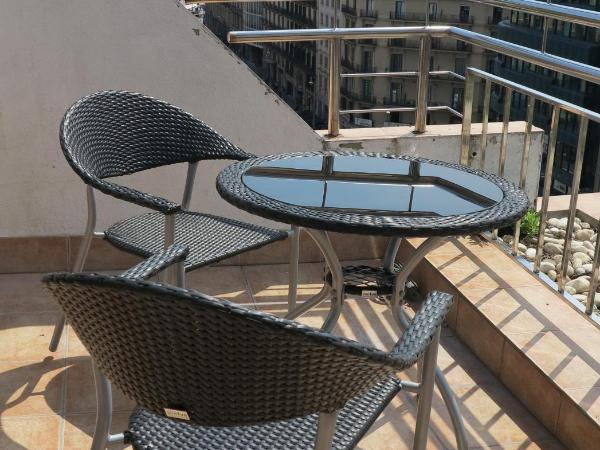 Serennia Exclusive Rooms : photo 5 de la chambre suite avec baignoire spa - vue sur ville 