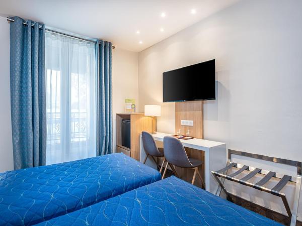 Hotel Terminus Montparnasse : photo 2 de la chambre chambre lits jumeaux exécutive