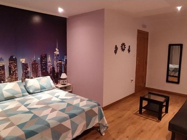 Hostal Happystay : photo 7 de la chambre chambre quadruple avec salle de bains privative
