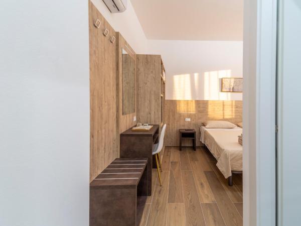 Mentana Rooms : photo 1 de la chambre chambre double ou lits jumeaux avec salle de bains privative