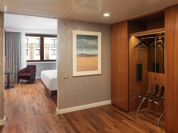 Hilton Berlin : photo 4 de la chambre chambre lit king-size - accessible aux personnes à mobilité réduite