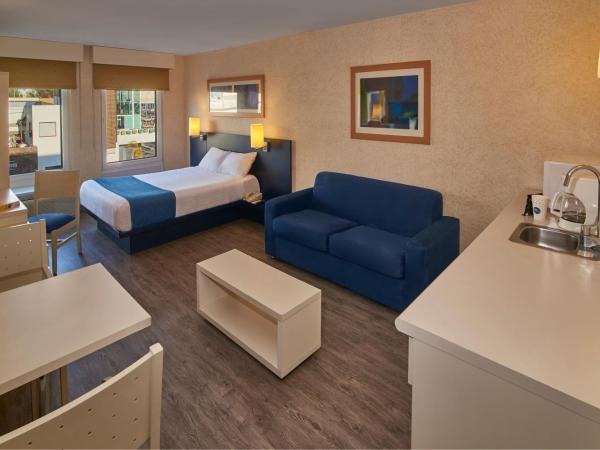 City Express by Marriott Puebla Angelopolis : photo 1 de la chambre suite lit queen-size avec canapé-lit