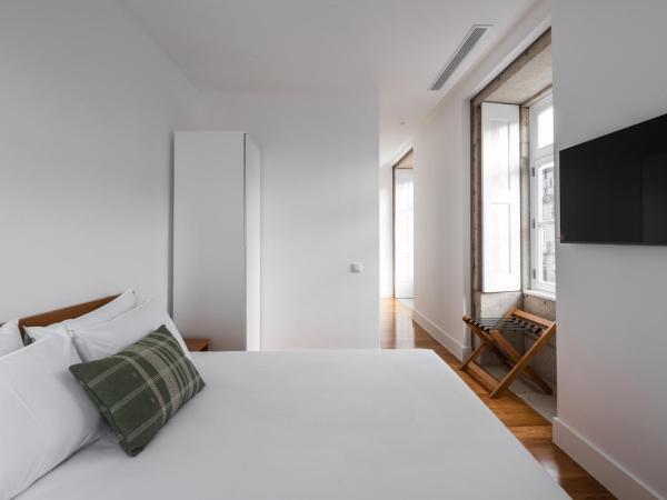 Avenida Viana Boutique Suites : photo 3 de la chambre chambre double avec balcon
