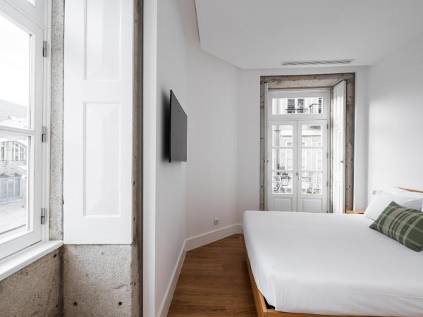 Avenida Viana Boutique Suites : photo 1 de la chambre chambre double avec balcon