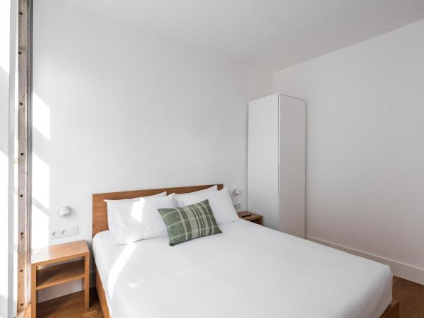 Avenida Viana Boutique Suites : photo 4 de la chambre chambre double avec balcon