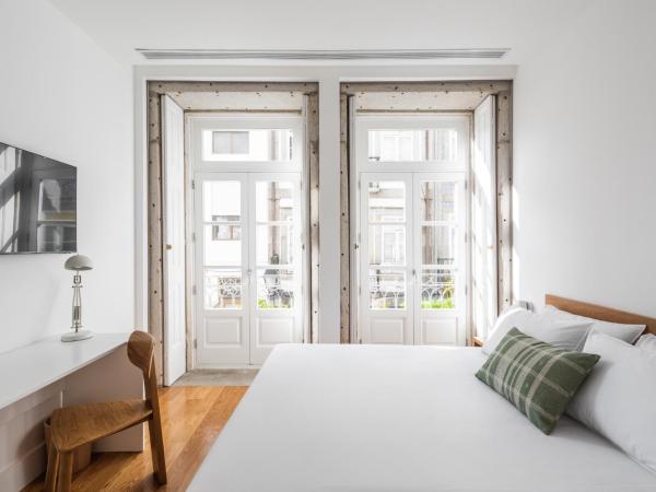 Avenida Viana Boutique Suites : photo 2 de la chambre chambre double avec balcon